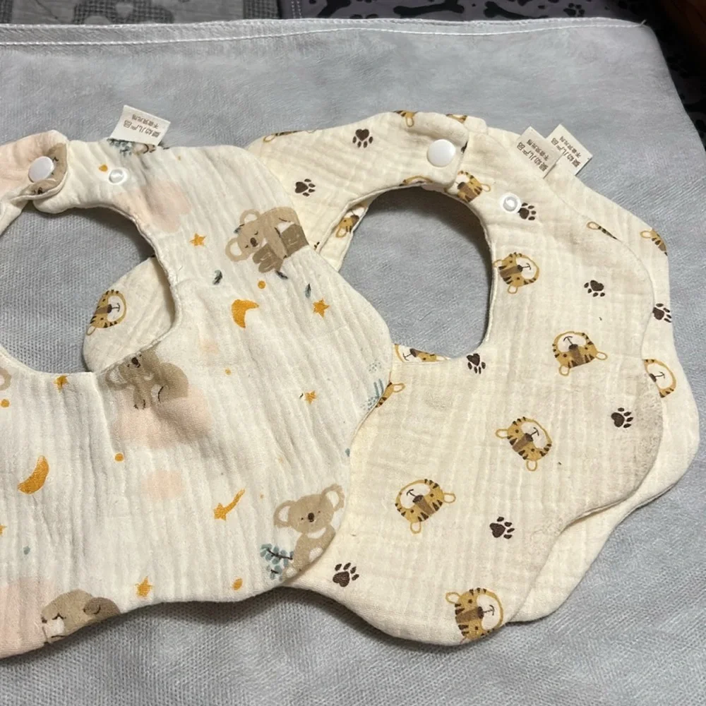 six Muslin bibs